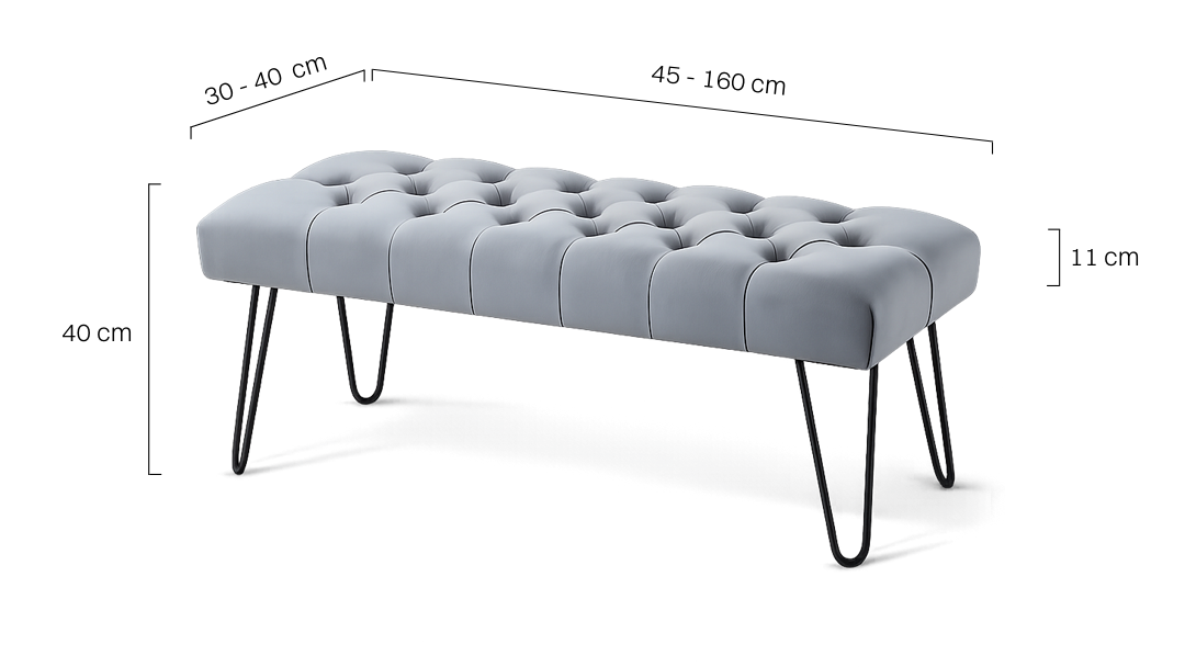 Graue Bank mit gesteppter Sitzfläche und metallenen Beinen in Form von Pins im Loft-Stil